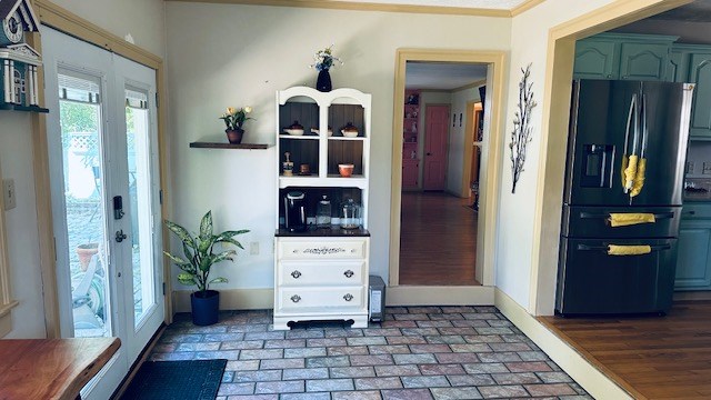 920 Woodbine St, Willard, OH 44890 - entrance foyer featuring french doors and brick patterned flooring
