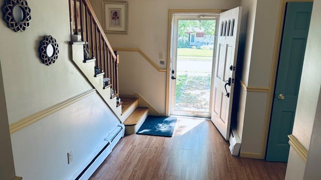 920 Woodbine St, Willard, OH 44890 - foyer entrance with wood finished floors and stairway
