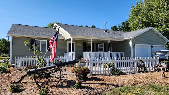 ranch-style home with covered porch and a garage