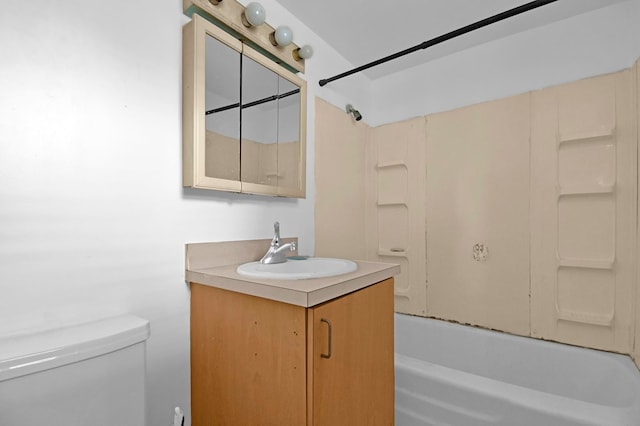 full bathroom featuring vanity, tub / shower combination, and toilet