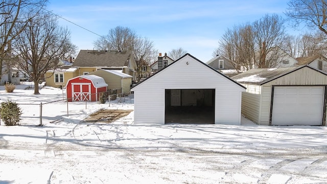 view of snow covered garage