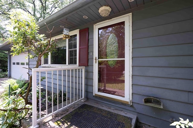 18373 Bentwood Dr, Doylestown, OH 44230 - entrance to property with a garage and a porch