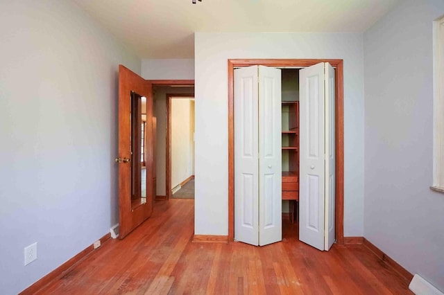 18373 Bentwood Dr, Doylestown, OH 44230 - unfurnished bedroom featuring light wood-style floors and a closet
