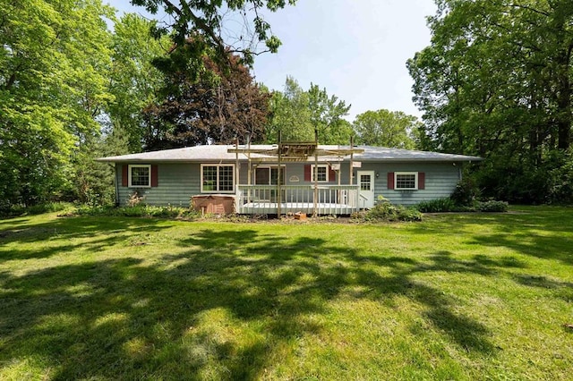 18373 Bentwood Dr, Doylestown, OH 44230 - view of front of home featuring a deck and a front yard