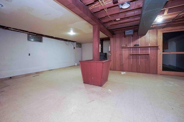 18373 Bentwood Dr, Doylestown, OH 44230 - finished below grade area featuring tile patterned floors and wooden walls