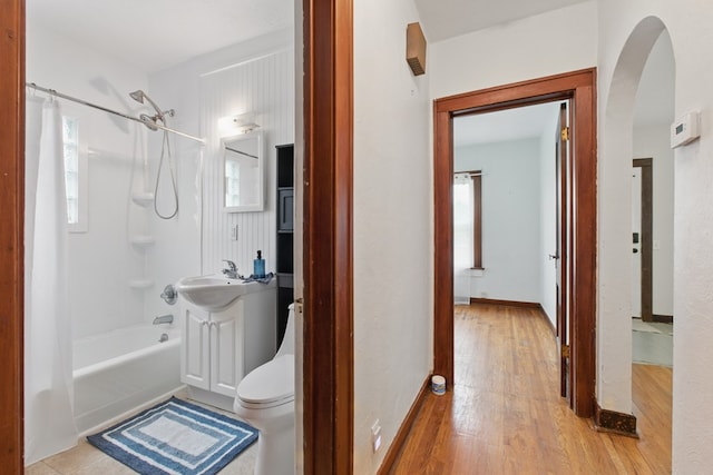 16.5 Monroe Ave, Shelby, OH 44875 - bathroom featuring wood finished floors, shower / tub combo with curtain, toilet, and vanity