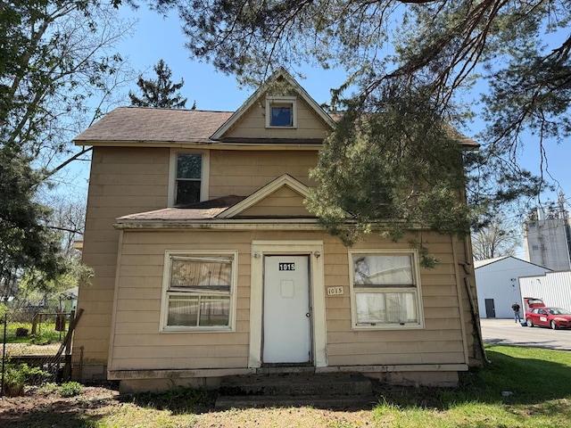 1015 N Cole St, Lima, OH 44805 - view of front facade featuring roof with shingles