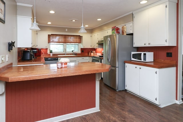 1321 W Hanley Rd, Mansfield, OH 44904 - kitchen featuring stainless steel appliances, wood counters, white cabinets, dark wood finished floors, and a sink