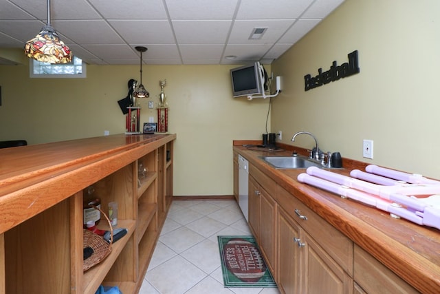 1321 W Hanley Rd, Mansfield, OH 44904 - indoor dry bar with light tile patterned floors, a paneled ceiling, pendant lighting, and dishwasher
