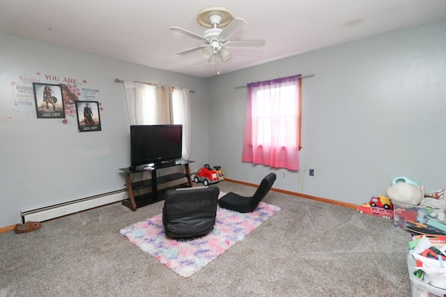 1321 W Hanley Rd, Mansfield, OH 44904 - rec room featuring baseboard heating, carpet floors, ceiling fan, and baseboards