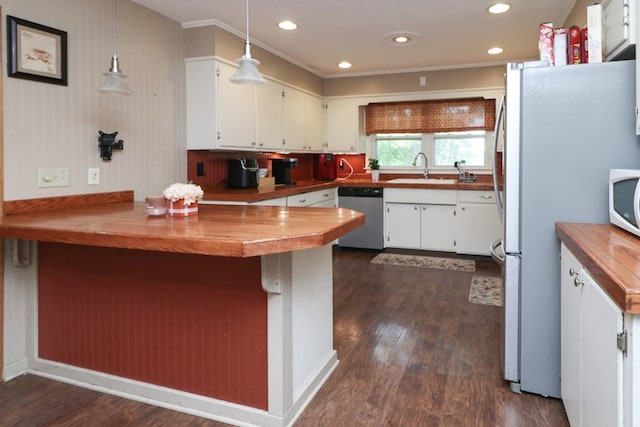 1321 W Hanley Rd, Mansfield, OH 44904 - kitchen featuring white appliances, wood counters, a peninsula, dark wood finished floors, and a sink