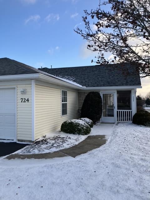 exterior space featuring a garage