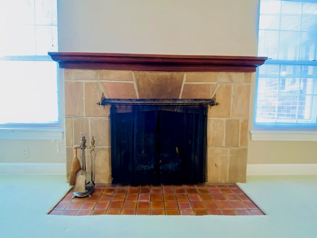 interior details featuring a fireplace