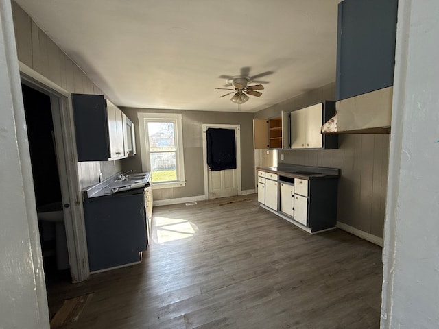 603 E Harding Way, Galion, OH 44833 - kitchen with ceiling fan, wood finished floors, and dark countertops