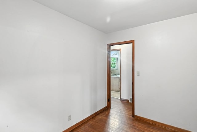 438 Mackey St, Galion, OH 44833 - unfurnished room featuring wood finished floors and baseboards