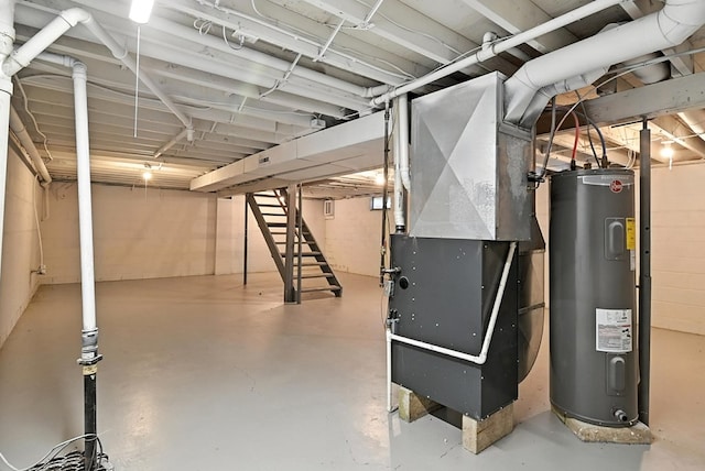 438 Mackey St, Galion, OH 44833 - unfinished basement with electric water heater, heating unit, and stairway