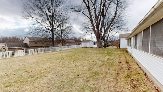 view of yard with a shed