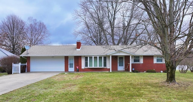 single story home with a garage and a front lawn