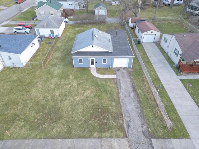 birds eye view of property with a residential view