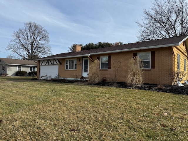 single story home with a garage, brick siding, a chimney, and a front lawn