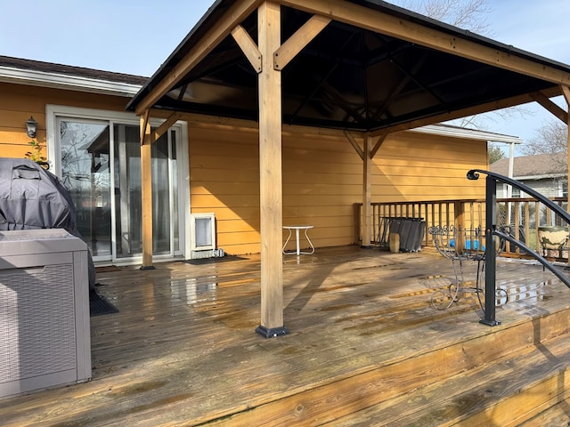 deck with ac unit, a gazebo, and central AC unit