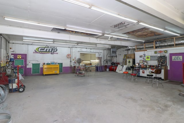 garage featuring a workshop area