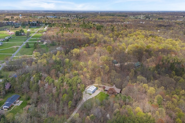 aerial view with a wooded view