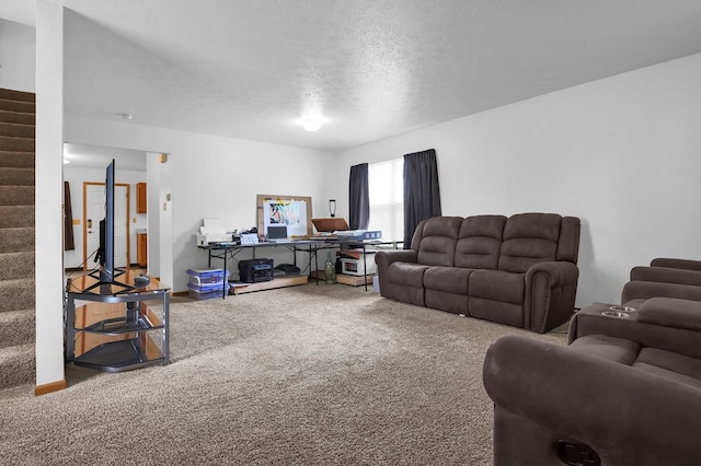 528 N Mulberry St, Street, OH 44902 - carpeted living room with stairway and a textured ceiling
