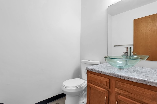 528 N Mulberry St, Street, OH 44902 - half bathroom featuring vanity and toilet