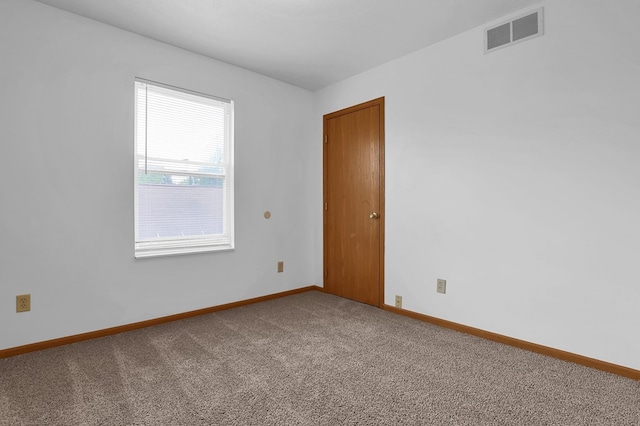 528 N Mulberry St, Street, OH 44902 - carpeted spare room featuring baseboards