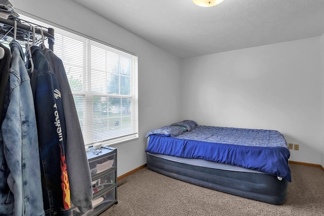 528 N Mulberry St, Street, OH 44902 - bedroom with baseboards and carpet flooring