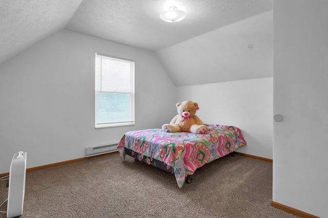 528 N Mulberry St, Street, OH 44902 - carpeted bedroom with a baseboard heating unit, vaulted ceiling, a textured ceiling, and baseboards