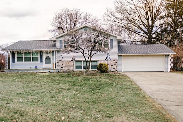 tri-level home featuring a chimney, roof with shingles, and a front yard