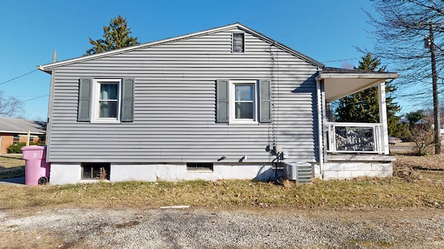 view of home's exterior with central AC