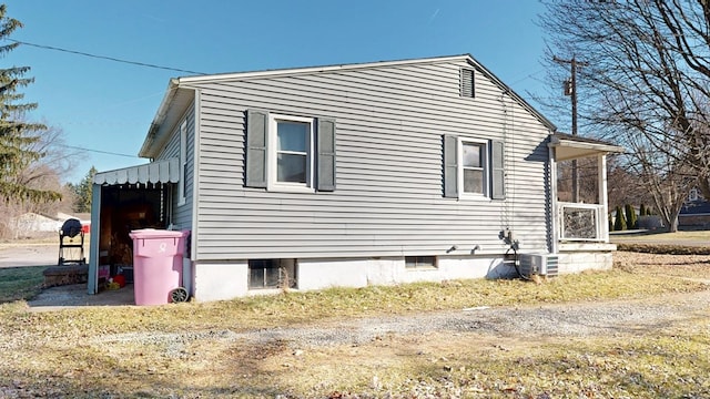 view of property exterior featuring central AC