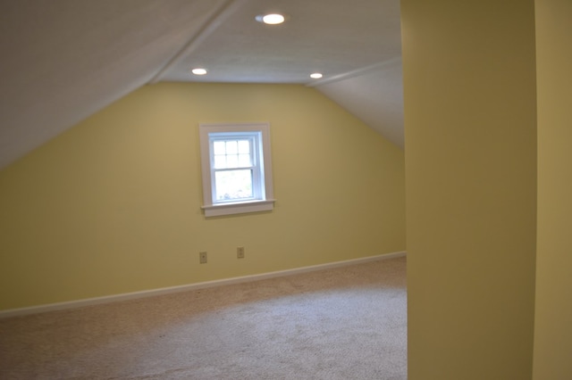 1211 S Sandusky Ave, Bucyrus, OH 44820 - additional living space with vaulted ceiling, carpet flooring, baseboards, and recessed lighting