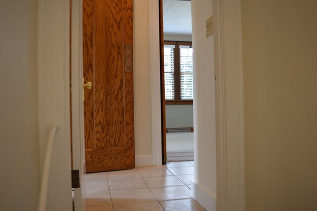 1211 S Sandusky Ave, Bucyrus, OH 44820 - corridor with light tile patterned flooring and baseboards