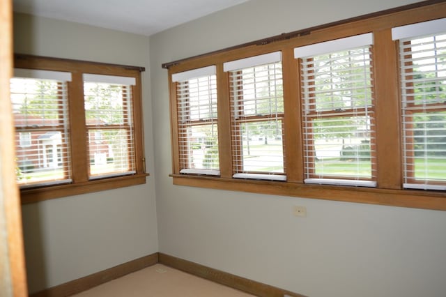 1211 S Sandusky Ave, Bucyrus, OH 44820 - spare room featuring baseboards