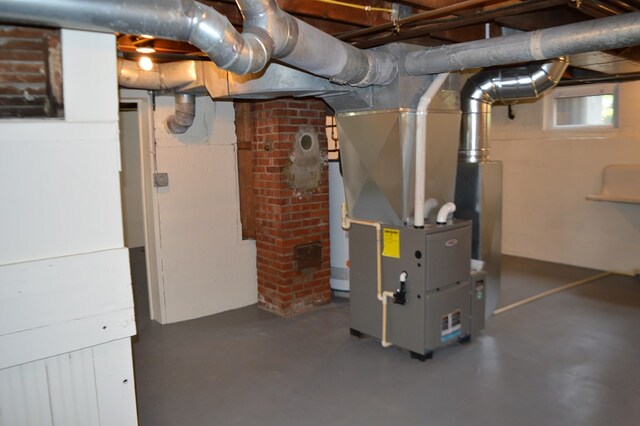 1211 S Sandusky Ave, Bucyrus, OH 44820 - below grade area featuring heating unit