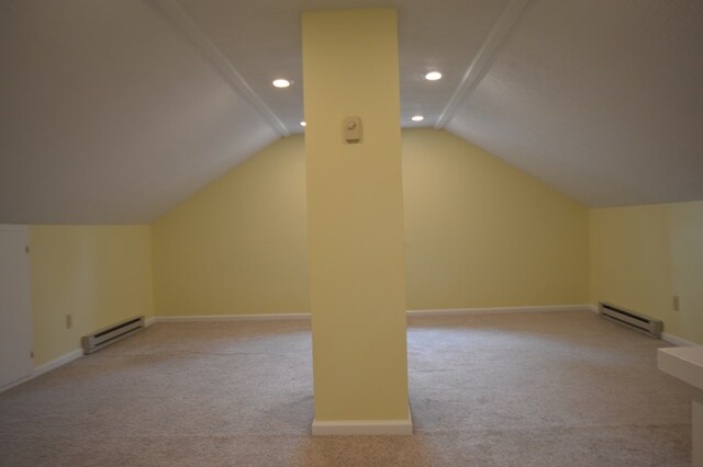 1211 S Sandusky Ave, Bucyrus, OH 44820 - bonus room with a baseboard heating unit, carpet flooring, vaulted ceiling, recessed lighting, and baseboards