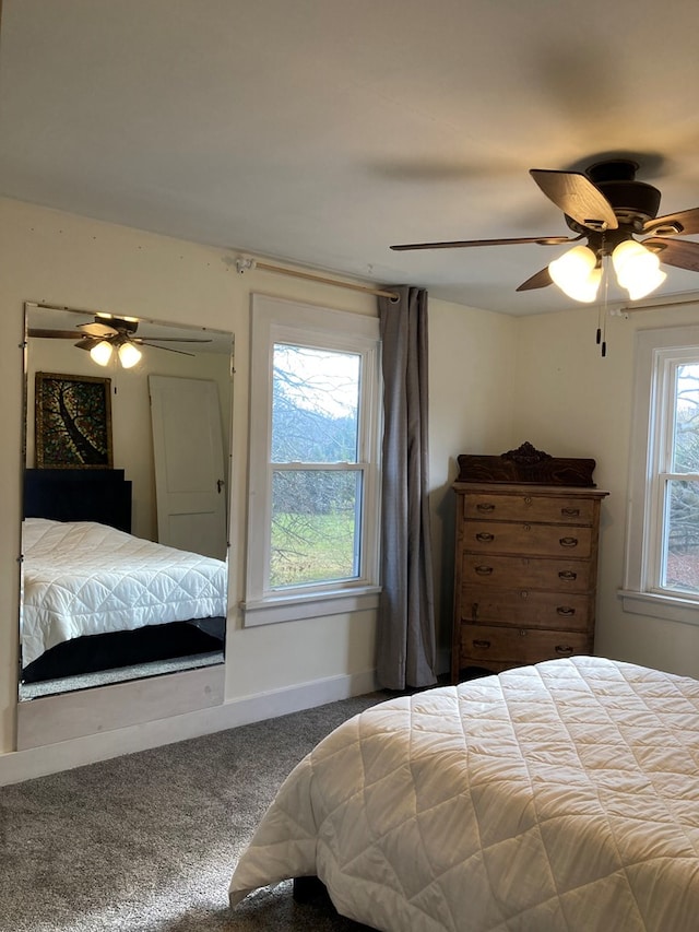 bedroom featuring carpet and ceiling fan