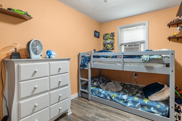 426 Charvid Ave, Mansfield, OH 44905 - bedroom featuring wood finished floors and cooling unit
