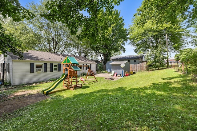 426 Charvid Ave, Mansfield, OH 44905 - fenced backyard with a playground and a shed