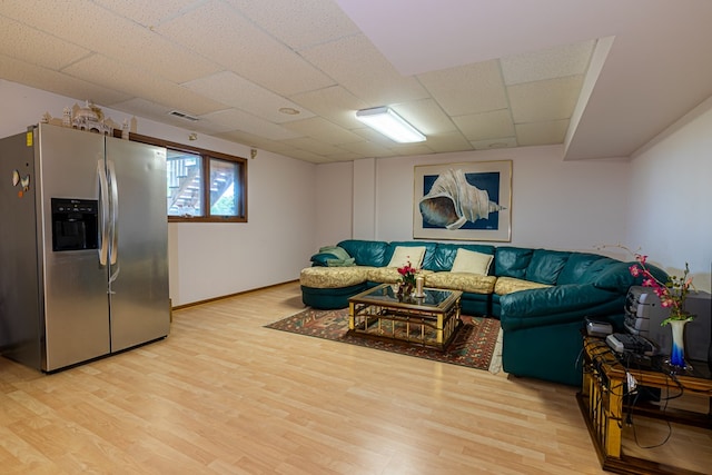 living room with light hardwood / wood-style flooring