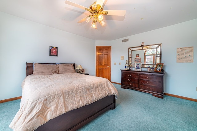 bedroom featuring ceiling fan and light carpet