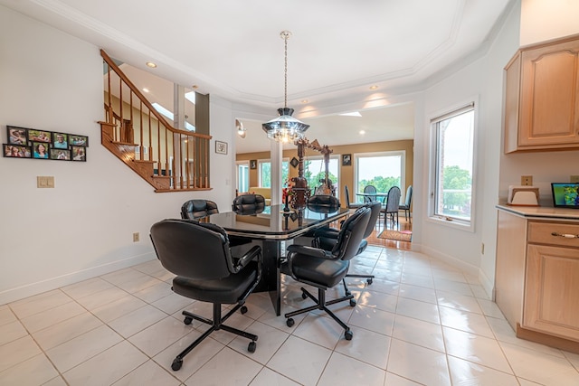 tiled dining area with ornamental molding and a notable chandelier