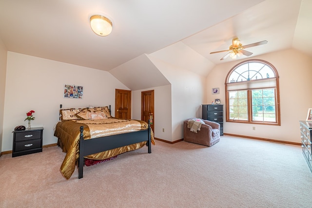 carpeted bedroom featuring ceiling fan and lofted ceiling