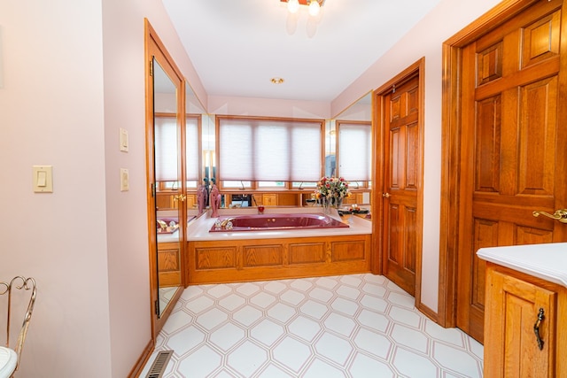 bathroom featuring a washtub