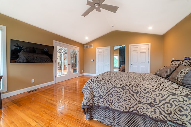 bedroom with hardwood / wood-style floors, ceiling fan, access to outside, and vaulted ceiling