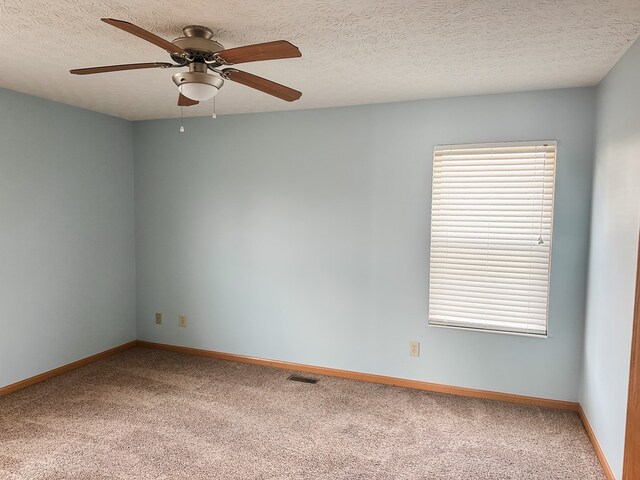 105 Purple Finch Loop, Pataskala, OH 43062 - unfurnished bedroom with baseboards, a spacious closet, and light carpet